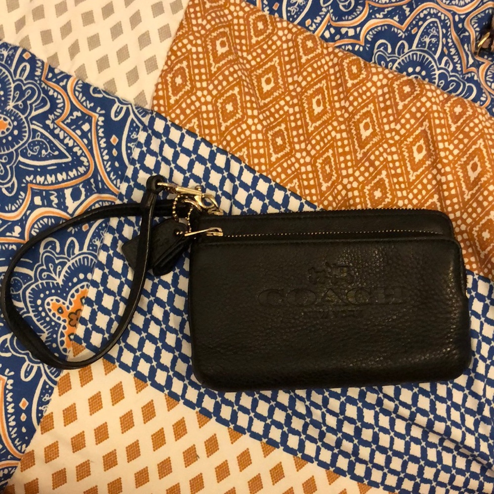 Black Coach wristlet with gold hardware